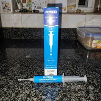 Customer photo of the Pestman box and syringe on a kitchen counter